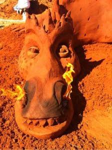 Fire breathing dragon made with red sand.