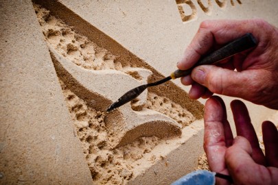 Qantas kangaroo in sand.