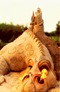 Dragon with a castle on its back.