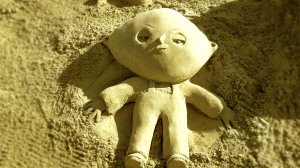 Sand sculpture of Stewie Griffin.